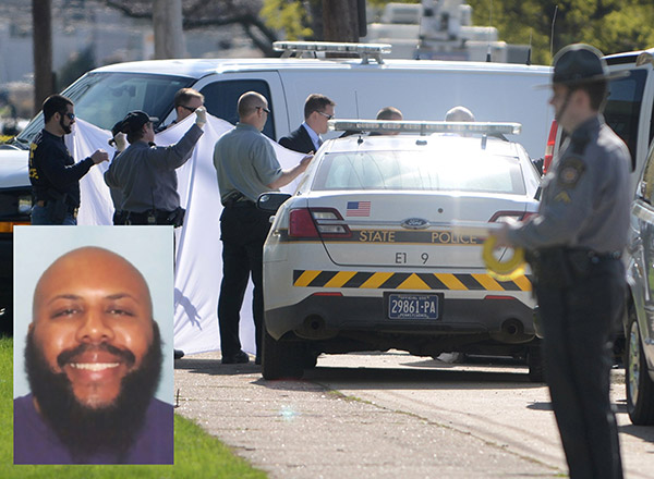  Anggota polis bersiap sedia untuk mengalihkan mayat Stephens (gambar sisipan) yang membunuh diri selepas dijejaki pihak berkuasa di Erie, Pennsylvania kelmarin. — Gambar AFP