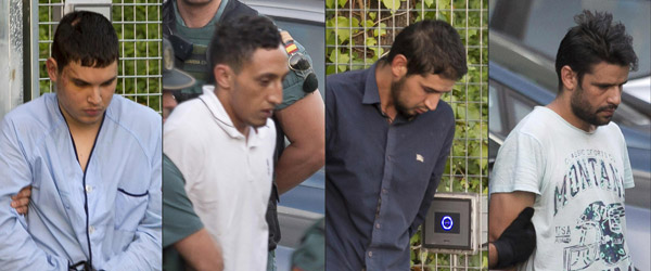  Kombinasi gambar yang dirakam kelmarin menunjukkan (dari kiri) Chemlal, Oukabir, Karib dan Aallaa ketika dieskot Pengawal Sivil Sepanyol dari pusat tahanan reman di Tres Cantos, Madrid untuk dipindahkan ke Mahkamah Negara. — Gambar AFP