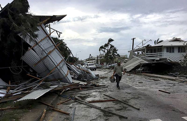  Gambar serahan John Pulu daripada Tagata Pasifika semalam menunjukkan kerosakan di Nuku’alofa selepas dibadai Siklon Gita malam kelmarin. — Gambar AFP