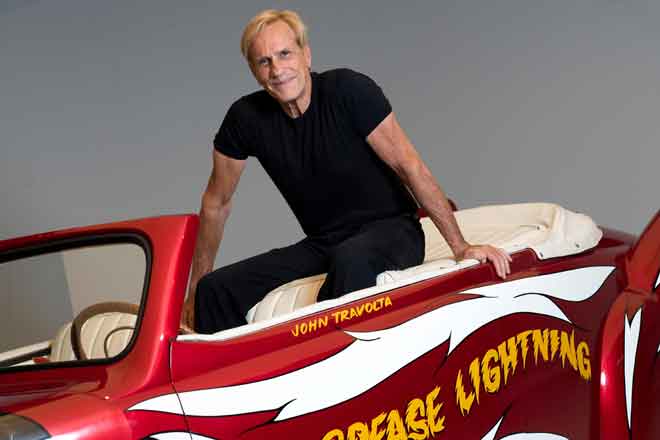  Pengarah AS Randal Kleiser semasa satu sesi bergambar untuk AFP bersama kereta ‘Grease Lightning’, untuk ulang tahun ke-40 filem itu, di  Petersen Automotive Museum di Los Angeles pada 12 Julai lepas. Kereta ‘Grease Lightning’ kini dipamerkan di Petersen Automotive Museum.  — Gambar AFP