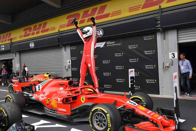  Vettel ceria selepas selepas memenangi perlumbaan Grand Prix Belgium di Litar SPA-FRANCORCHAMPS, Belgium Ahad  lepas. — Gambar AFP