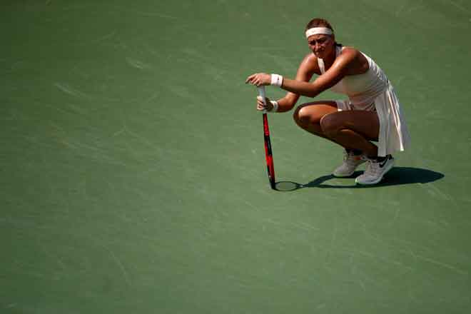  Reaksi Kvitova ketika menentang Wickmayer pada kejohanan tenis Terbuka AS di New York, Amerika Syarikat Isnin lepas. — Gambar AFP