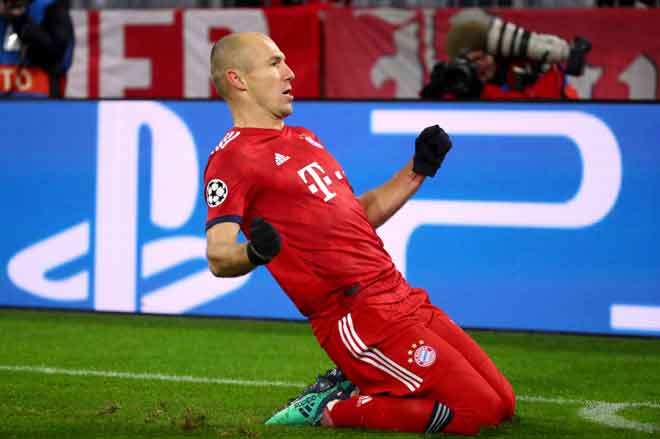  Robben meraikan jaringannya ketika membantu Bayern menewaskan Benfica pada aksi Kumpulan E saingan Liga Juara-Juara di Allianz Arena, Munich pada 27 November lepas. — Gambar Reuters