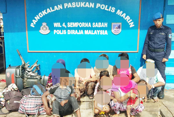 BARANG rampasan dan kesemua tangkapan dibawa ke pangkalan Marin Semporna.