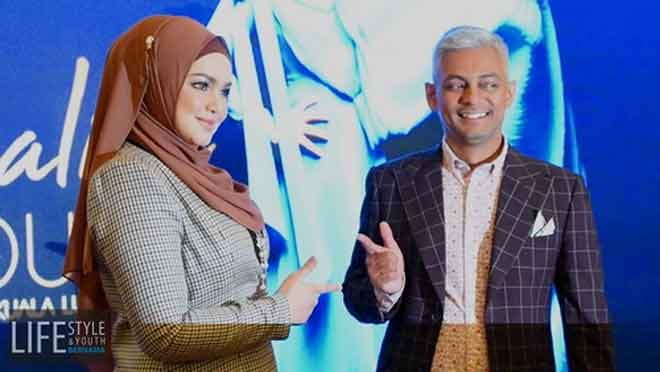  Datuk Seri Siti Nurhaliza bersama Pengarah Eksekutif Shiraz Projects, Shirazdeen Karim pada sidang media bagi mengumumkan konsert jelalah yang akan diadakan awal tahun depan. 