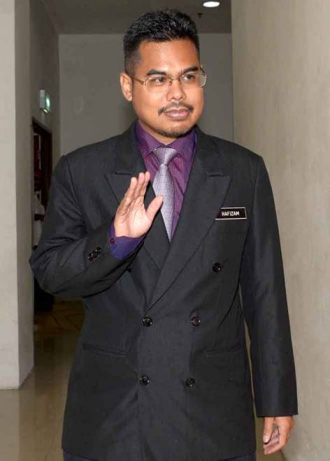  Ahmad Hafizam yang merupakan saksi ke-24 hadir pada prosiding inkues bagi menentukan punca kematian Allahyarham Muhammad Adib Mohd Kassim di Mahkamah Koroner Kompleks Mahkamah Shah Alam dekat Shah Alam, semalam. — Gambar Bernama