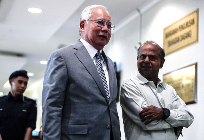  Najib hadir pada hari ketiga perbicaraan kes dana RM42 juta milik syarikat SRC International Sdn Bhd di Kompleks Mahkamah Seksyen Kuala Lumpur di ibu negara semalam. — Gambar Bernama