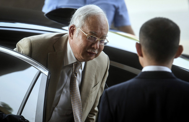 Najib tiba di Kompleks Mahkamah Kuala Lumpur pada hari ke-18 perbicaraan berhubung kes penyelewengan SRC International Sdn Bhd, yang dihadapinya, hari ini. - Gambar Bernama 
