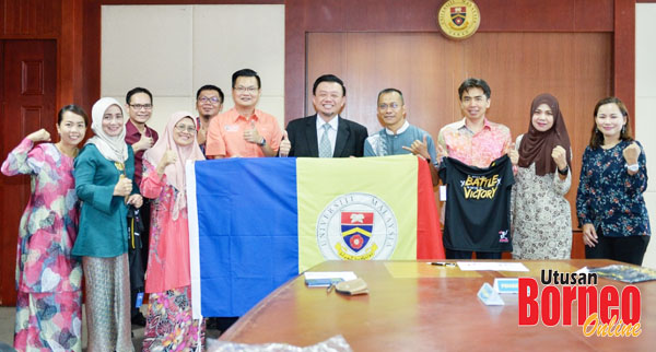  Kakitangan UMS yang akan menyertai Kuching Marathon 2019 merakamkan gambar bersama Prof. Dr. Taufiq Yap.