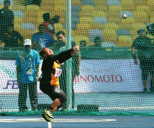  Grace Wong membuat balingan semasa Sukan SEA Kuala Lumpur 2017.