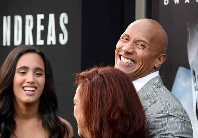  Gambar fail menunjukkan aktor Dwayne ‘The Rock’ Johnson menghadiri tayangan perdana filem ‘San Andreas’ di Hollywood pada 26 Mei 2015. ‘The Rock’ telah dinamakan sebagai pelakon dengan pendapatan tertinggi di Hollywood bagi tahun kedua berturut-turut. – Gambar AFP