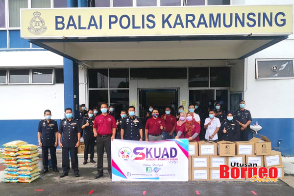  Habibi (empat kiri) bersama pihak KPS menyampaikan bantuan kepada anggota PVR IPD Kota Kinabalu.