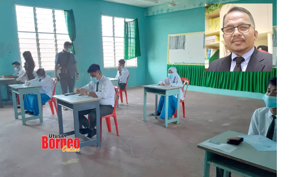  Pelajar menjalani peperiksaan dalam suasana aman dengan pematuhan SOP. Abdul Walit (gambar kecil).