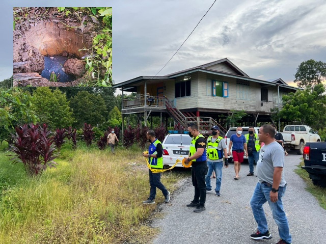 Sepasukan polis sedang memantau rapi kawasan penemuan serpihan logam (gambar sisipan) dipercayai sebahagian komponen roket milik negara China yang dijumpai terbenam di perkarangan rumah seorang penduduk di Goodwill Garden, Sepupok, Niah pada Ahad.