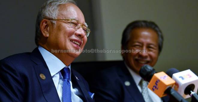 SIDANG MEDIA: Najib semasa sidang media selepas berlangsungnya Sidang kemuncak Khas ASEAN-Australia 2018 di Australia semalam. Turut kelihatan ialah Anifah. — Gambar Bernama