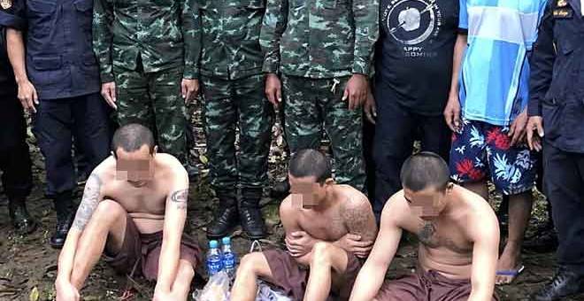 TANGKAP SEMULA: Pihak berkuasa Thailand berjaya menangkap semula tiga banduan yang melarikan diri daripada Mahkamah Lang Suan, di wilayah Chumphon, Bangkok, semalam. — Gambar Bernama
