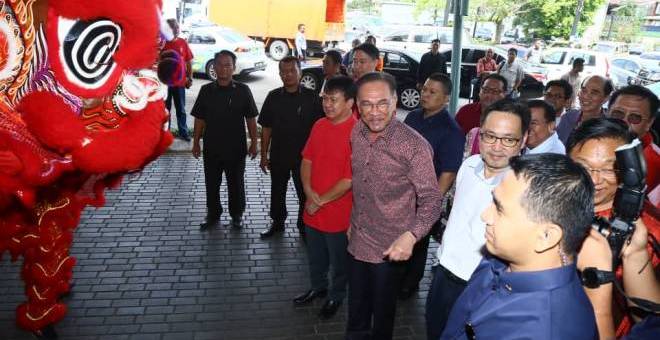 Chong dan Anwar pada majlis rumah terbuka PH Sarawak.