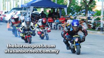 MENARIK: Antara aksi kategori Open Master pada ‘Mydin Minibike Merdeka Fun Race 2017’.