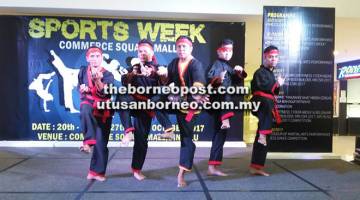 PELUANG: Salah seorang ‘guro’ bersama anak-anak muridnya menunjukkan seni kuntau mereka pada  Minggu Sukan berkenaan. 