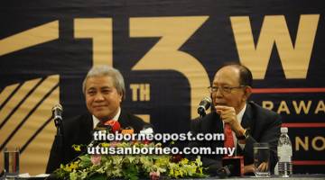 SIDANG MEDIA: Awang Tengah bersama Musa pada sidang media selepas majlis penangguhan WIEF Ke-13 di BCCK, Kuching semalam.