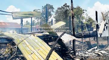 MUSNAH: Keadaan rumah di Kampung Hilir, Sessang yang terbakar pagi semalam.