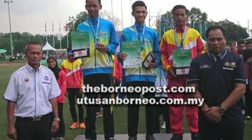 MOHD Fitri Haeuser dan Mohd Nizam Marzuki berjaya meraih emas dan perak acara 100m (L12).