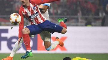 PEMUSNAH: Griezmann menjaringkan gol kedua Atletico ketika beraksi pada perlawanan final Liga Europa menentang Marseille di Stadium Parc OL, Decines-Charpieu Rabu lepas. — Gambar AFP