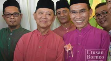 MOHAMMADIN dan Assafal bergambar selepas majlis.