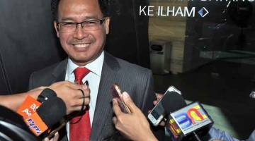EFISIEN: Mohd Rani selepas menghadiri Mesyuarat Majlis Penasihat Kerajaan yang dipengerusikan oleh Tun Daim Zainuddin semalam. — Gambar Bernama