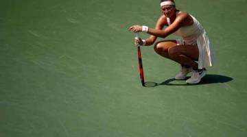 KELETIHAN: Reaksi Kvitova ketika menentang Wickmayer pada kejohanan tenis Terbuka AS di New York, Amerika Syarikat Isnin lepas. — Gambar AFP