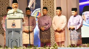 JUHAR (kiri) ketika menyampaikan ucapan perasmian sempena Majlis Perhimpunan Maal Hijrah Peringkat Negeri Sabah 2018.