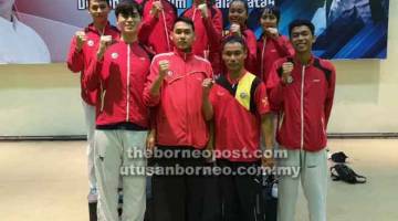 TERBAIK: Atlet Kelab Seni Mempertahankan Diri & Taekwondo Kuching (WTF) gembira dengan kejayaan mereka di Pulau Pinang.