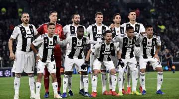 MANTAP: Barisan kesebelasan utama pasukan Juventus yang diturunkan pada aksi Liga Juara-Juara menentang Valencia di Stadium Juventus di Turin, baru-baru ini. — Gambar AFP