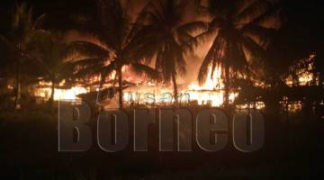 SUASANA kebakaran di perkampungan atas air Kg Keramat, Beluran.