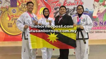 SEJARAH: Pasukan Persatuan Global Taekwondo Sarawak meraih pingat emas pada Kejohanan High Kick National Taekwondo Championship 2019 di Kelantan.