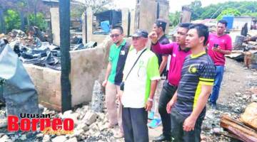 TINJAU: Innah berkesempatan meninjau lokasi kebakaran di Kampung Stesen, Penangah.