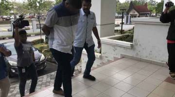 DIREMAN: Seorang lelaki berusia 26 tahun yang menyamar sebagai Ejen Pemilikan Semula kenderaan dengan menggunakan permit palsu, direman selama dua hari bermula semalam. — Gambar Bernama