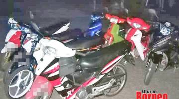 OPERASI: Polis menyita tujuh motosikal di dalam Ops Samseng Jalanan, di Jalan Melabau Beaufort.