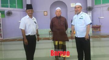 TINJAU MASJID:  Romzi (kanan) bersama Pembantu Tadbir JHEAINS Sandakan, Raman Rabi (kiri) bertemu dengan pihak jawatankuasa masjid dalam tinjauan ke masjid-masjid di daerah Sandakan.