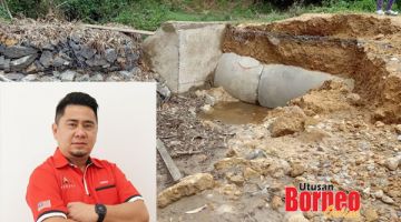 ROSAK: Jalan Kg Sarang yang rosak dan tidak dapat digunakan oleh penduduk kampung akibat banjir baru-baru ini. 