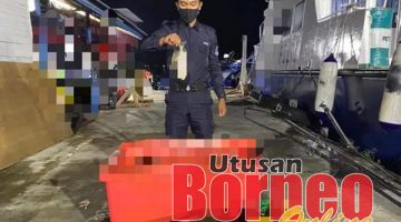 BOM IKAN: Hasil laut dan peralatan bom ikan yang dirampas dibawa ke Markas Operasi PPM Semporna untuk tindakan selanjutnya.