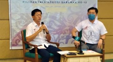 Lau (kiri) dan Hii semasa sidang media terakhir mereka di Sibu, hari ini.