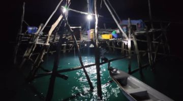 PERIKSA: Kawasan bagang ikan bilis yang diperiksa di kawasan Tanjung Limau-Limauan Kudat.