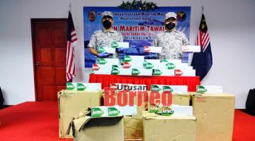 SELUDUP: Rokok yang cuba diseludup masuk dari negara jiran berjaya dirampas.