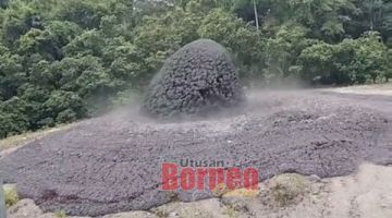TULAR: Kejadian fenomena letusan gunung berapi lumpur di Tabin Wildlife Reserve yang tular di media sosial, semalam.
