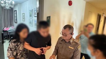 Seorang lelaki warganegara Malaysia berusia 26 tahun yang mempunyai rekod jenayah di Malaysia – bersama teman wanita warga Thailand berusia 30 tahun, ditahan di Bangkok pada 7 Mac. - Gambar BERNAMA