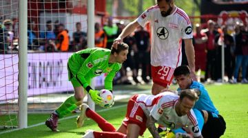 Babak aksi perlawanan Bundesliga Jerman di antara Union Berlin dan Bayer Leverkusen di Berlin. — Gambar AFP