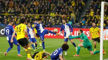 Sebahagian daripada babak aksi perlawanan suku akhir kedua Liga Juara-Juara di antara Dortmund dan Atletico Madrid di Dortmund. — Gambar AFP