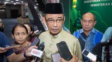 Abdul Karim ketika ditemui media semasa majlis tersebut. - Gambar Chimon Upon