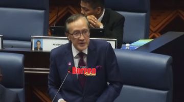 PENGGULUNGAN: Masidi semasa membaca ucapan penggulungan Kementerian Kewangan sidang DUN Sabah.